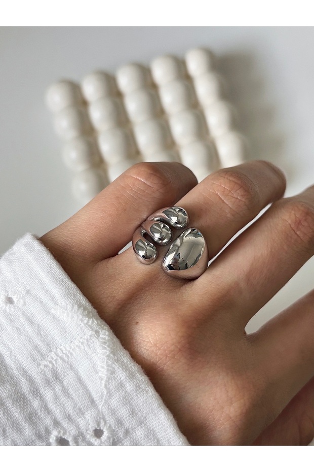 حلقة غير متناظرة متعددة الانحناء - 1