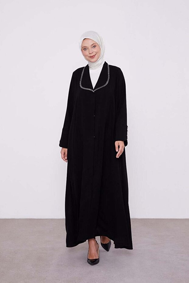 تفاصيل معالجة الياقات السوداء - 1