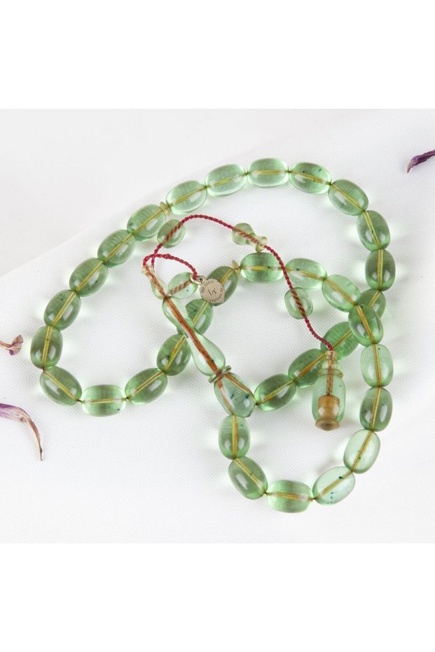Fire Amber Beyzi Cut 8X11Mm Rosary - Water Green Transparent