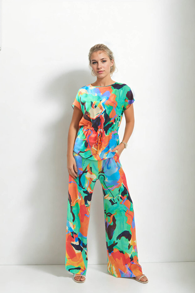 بلوزة منقوشة برباط على الخصر - 2