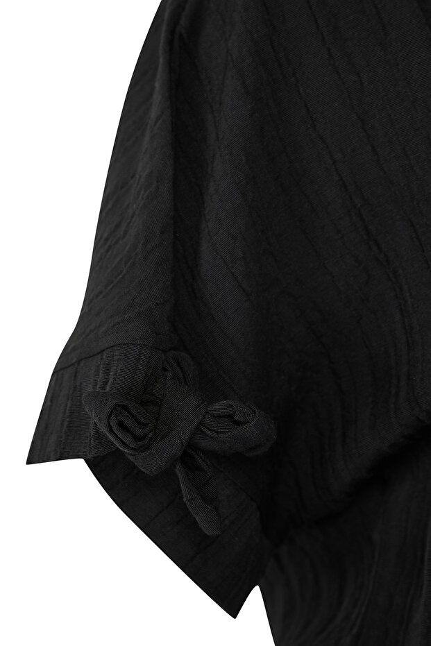 Schwarz*001 Einfarbig gewebtes 99 % Polyester, 1 % Elastan - 7