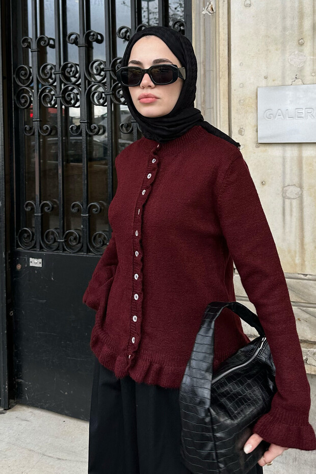كشكش مفصلة سترة محبوكة
