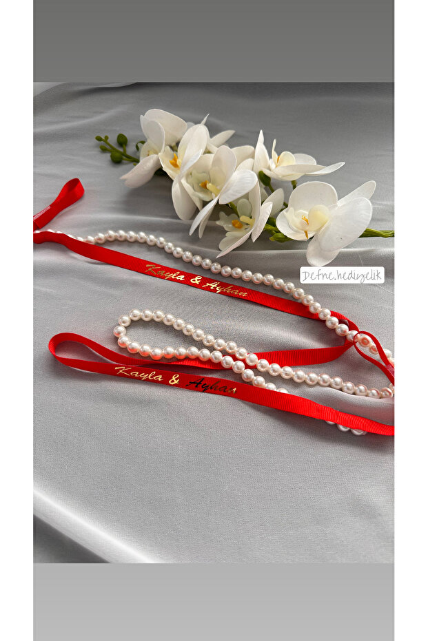 Engagement Ribbon with Spilled Pearls