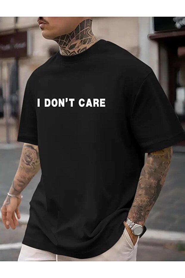 تي شيرت أسود من القطن الممشط مطبوع عليه عبارة I Dont Care