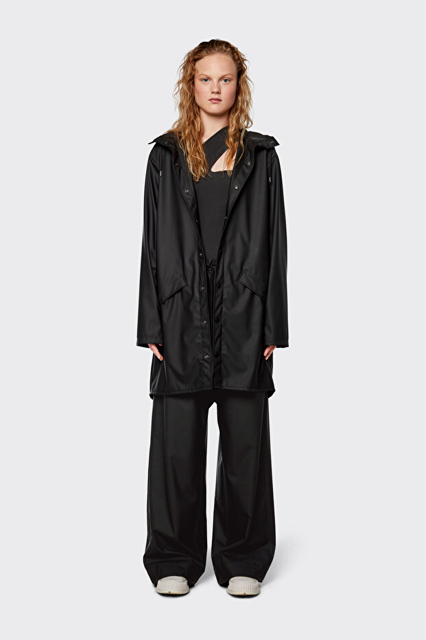 Waterproof jacket is cut from Rains’ signature PU fabric and features ultrasonically welded seams. - 2