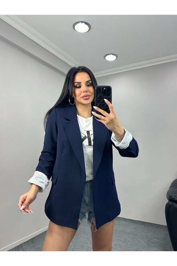 سترة نسائية ذات ياقة شال بدون أزرار وبطانة منقوشة بأكمام قابلة للطي