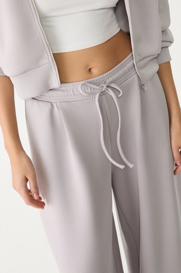 Yumuşak dokulu ve pilili jogger pantolon - 4