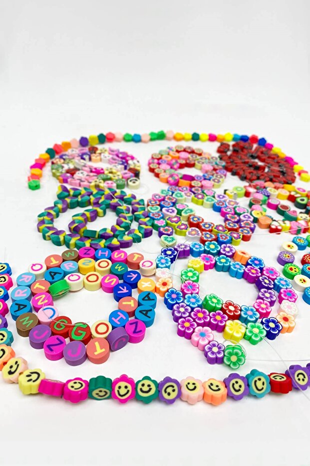 Figured and patterned fimo bead set 11 strings