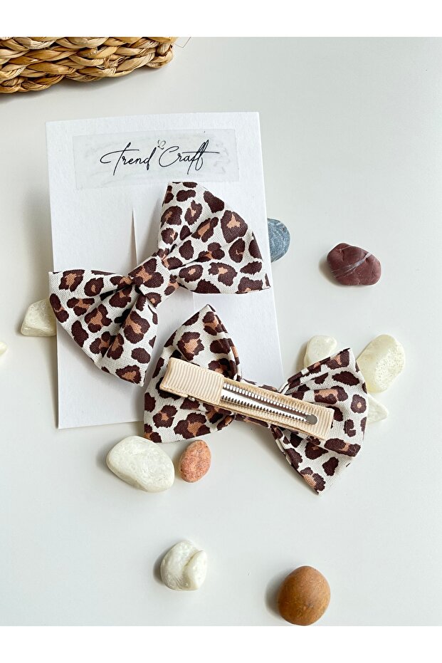 مشبك مشبك على شكل فيونكة منقوش بنقشة الفهد مكون من قطعتين - 1