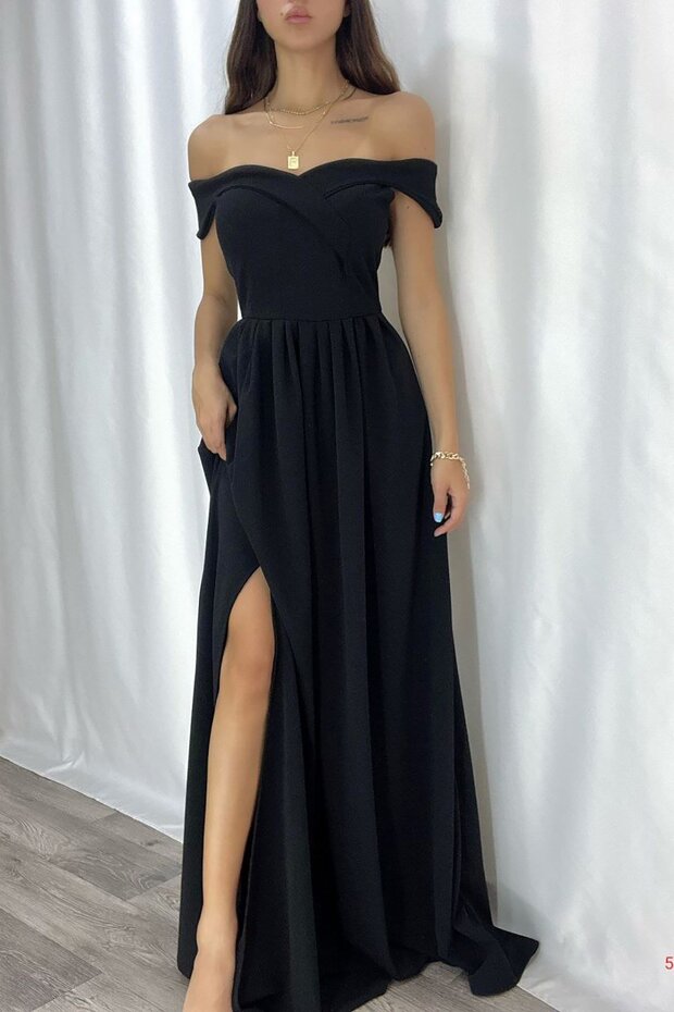 Black imported crepe fabric shoulder detailed slit dress