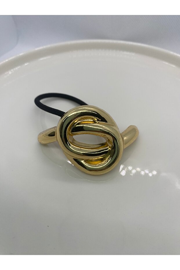 Gold Metal Knot Figured Rubber Buckle