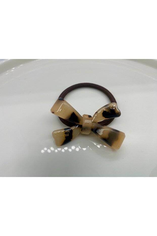 مشبك على شكل عظمة مع شكل القوس - 1