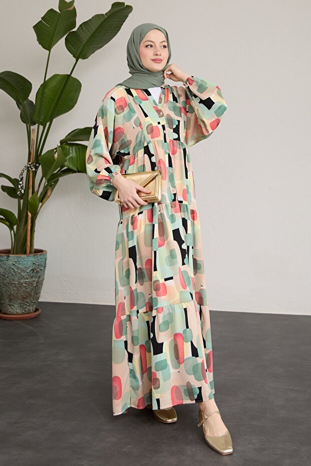 فستان أخضر بفتحة هندسية بيضاوية - 1