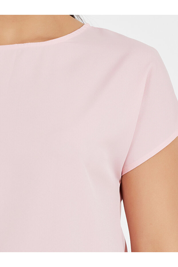 بلوزة سادة برقبة دائرية وأكمام ممتدة - 4