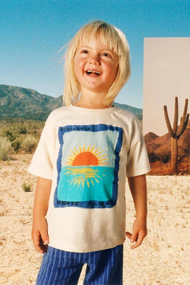 Unisex Kids Sunset Printed Cream T-Shirt and Blue Striped Pants Set