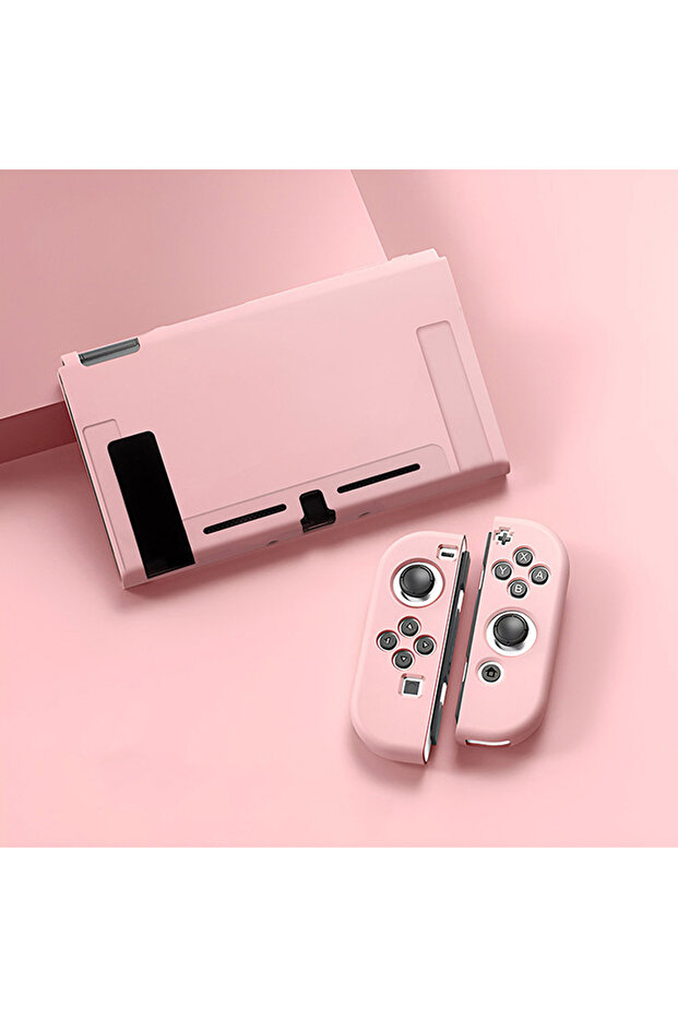 حافظة واقية باللون الوردي من NS متوافقة مع وحدة تحكم Switch OLED وJoy-Cons، يمكن إدخالها في الجهاز.