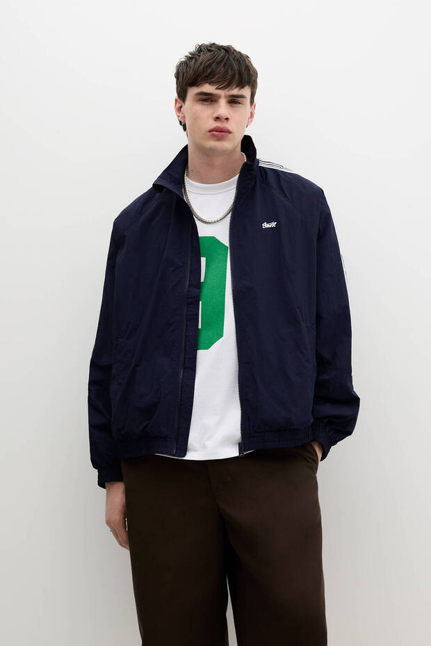 Raincoat with side stripes - 1