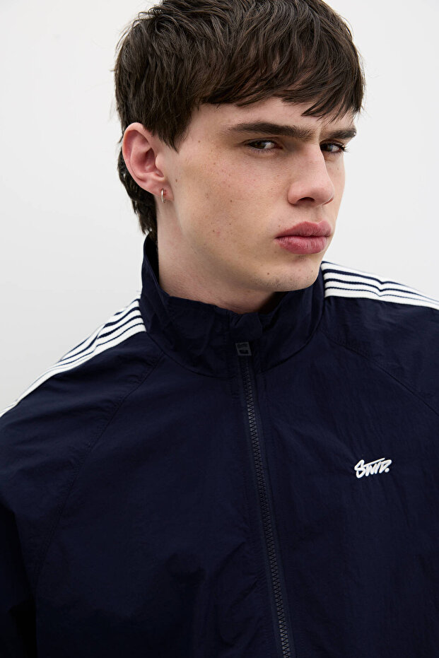 Raincoat with side stripes - 5