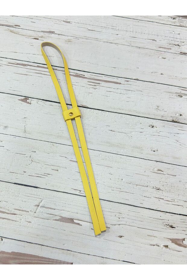 حقيبة جلدية برباط أصفر - 1