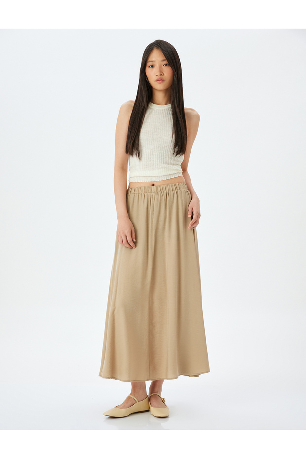 Modal fabric elastic waistband long flared skirt.