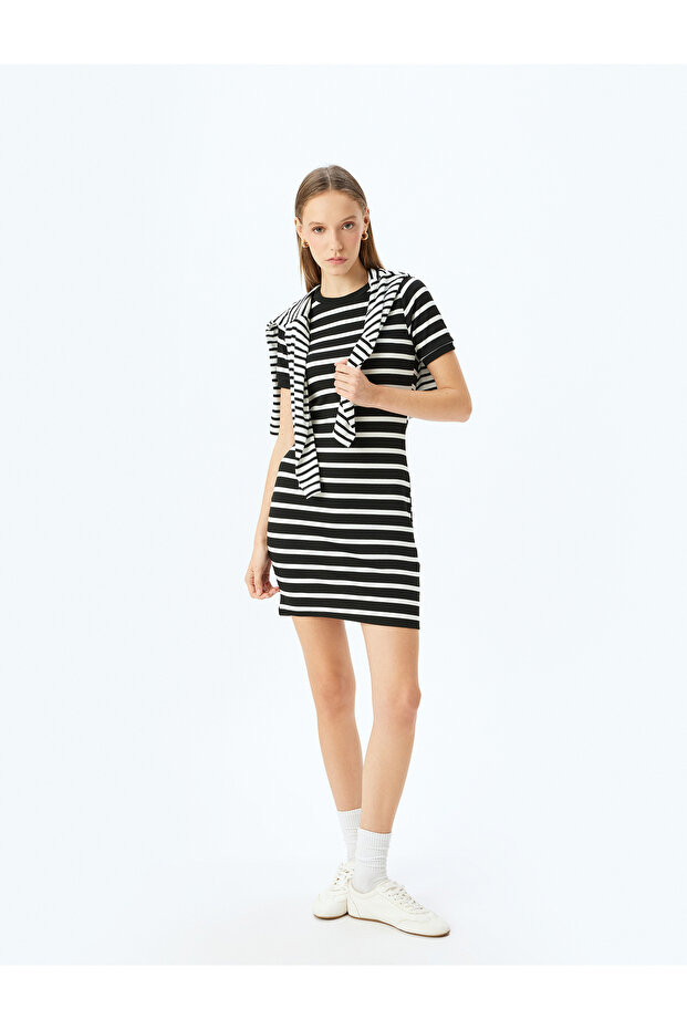 Mini crew neck ribbed short sleeve bodycon dress.