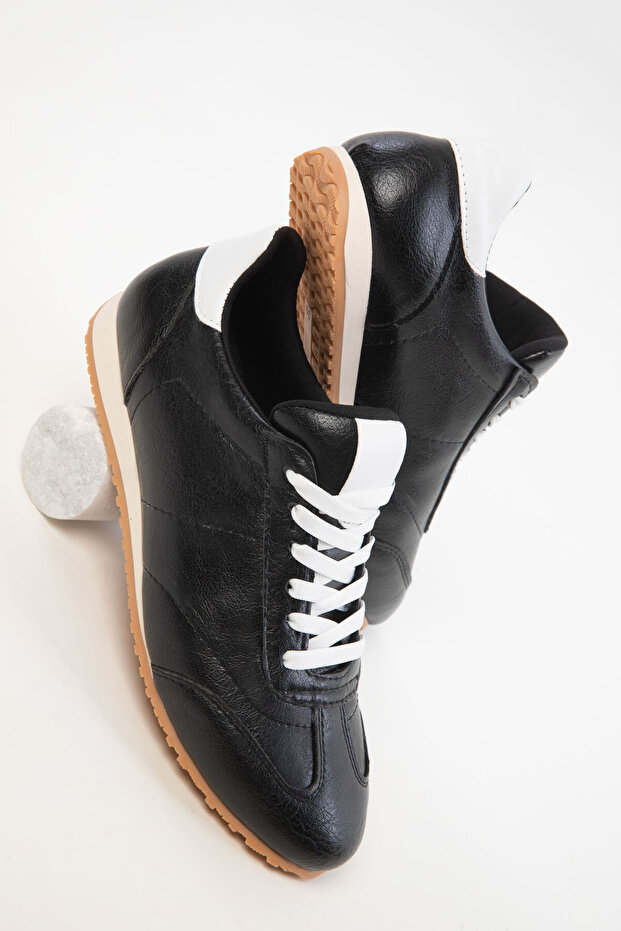 Schwarzer Damen-Sneaker 20381 - 4