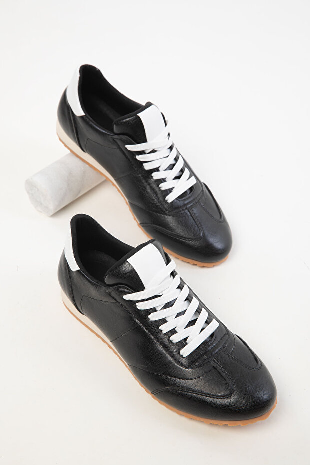Schwarzer Damen-Sneaker 20381 - 2