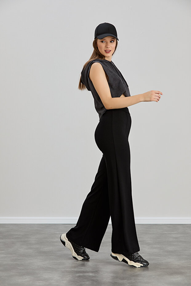 بنطال نسائي أسود مشروط واسع الساق مخطط وخصر عالي وناعم ومطاط من الليكرا - 6