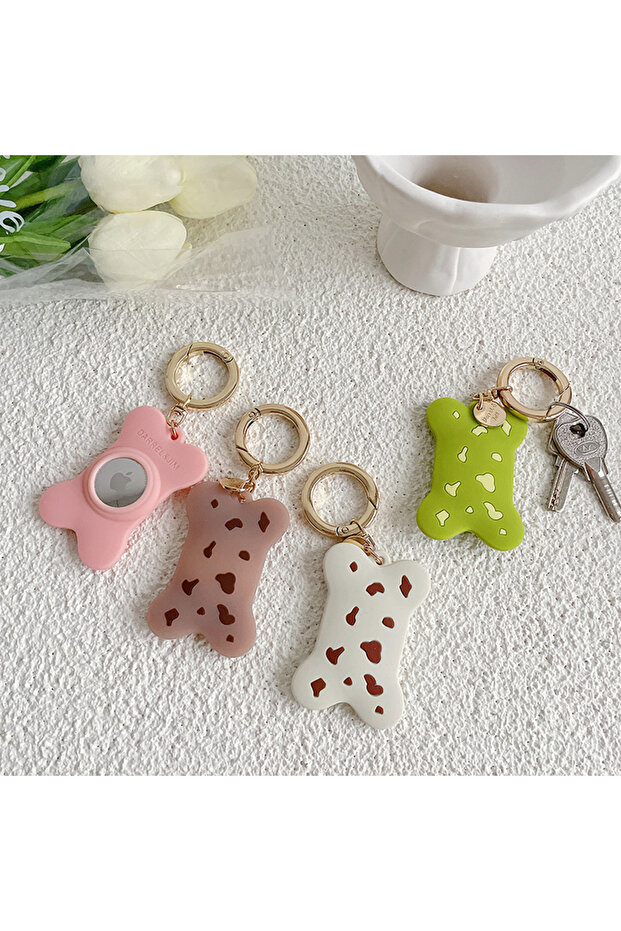 سلسلة مفاتيح من السيليكون بتفاصيل ذهبية على شكل عظمة متوافقة مع - 3