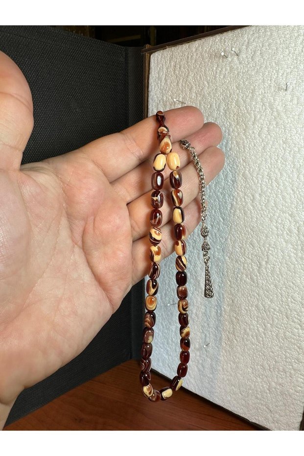 Sikma amber tasbih brown cream capsule cut 7x10mm t-259