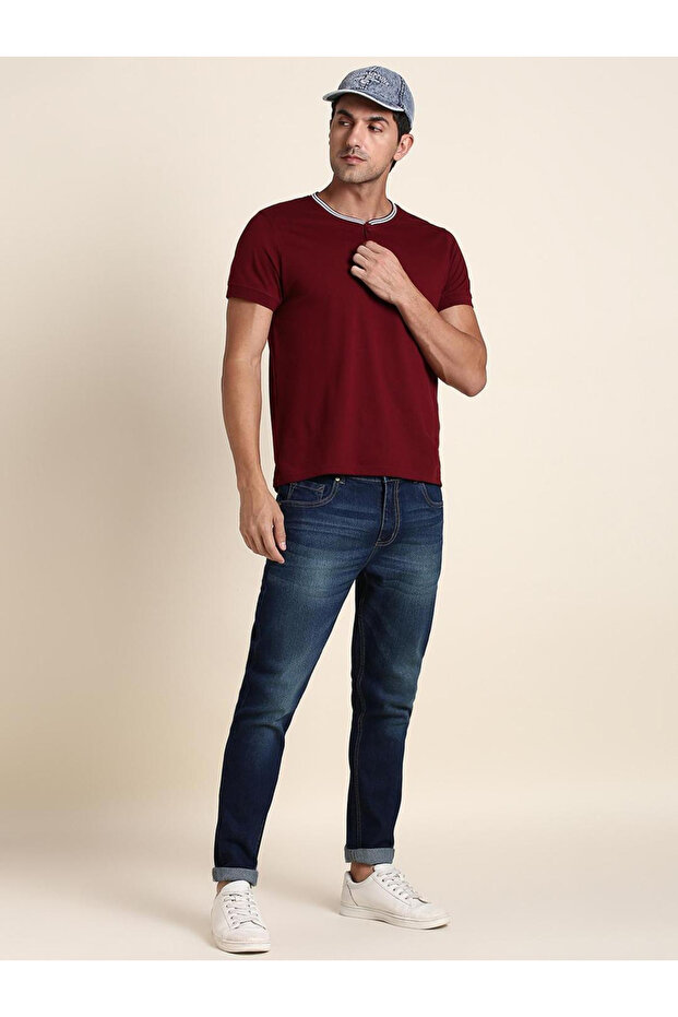 بنطال جينز بقصّة Slim Fit متوسطة الغسل