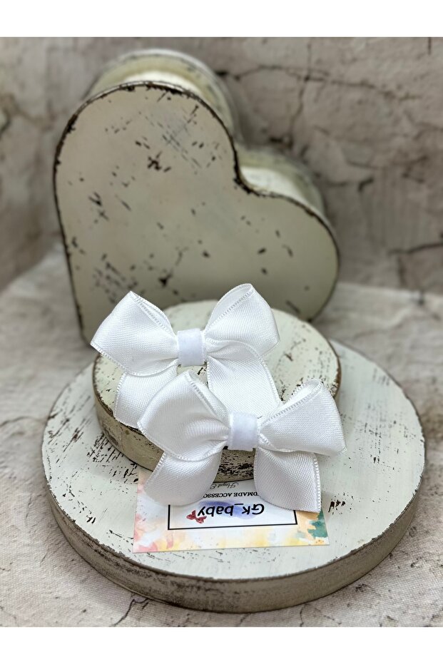 مشبك مطاطي على شكل فيونكة بيضاء - 1