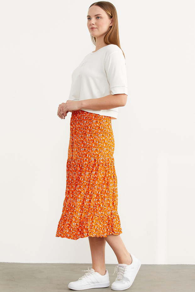 تنورة برتقالية منقوشة بأزرار مرنة - 4