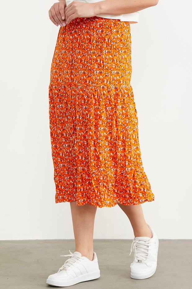 تنورة برتقالية منقوشة بأزرار مرنة - 3