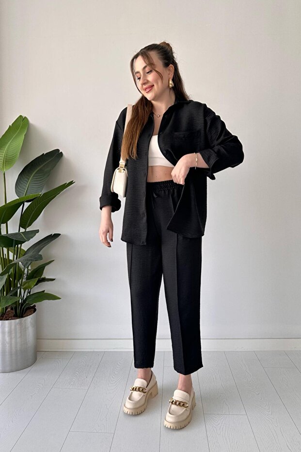 بدلة كتان مزدوجة باللون الأسود - 3