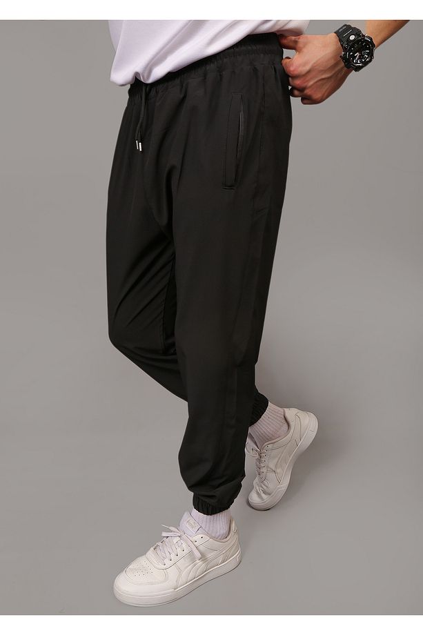 Paraşüt Kumaş Regular Fit Paça Lastikli Cep Fermuarlı Eşofman Altı - 3