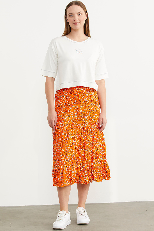 تنورة برتقالية منقوشة بأزرار مرنة - 1