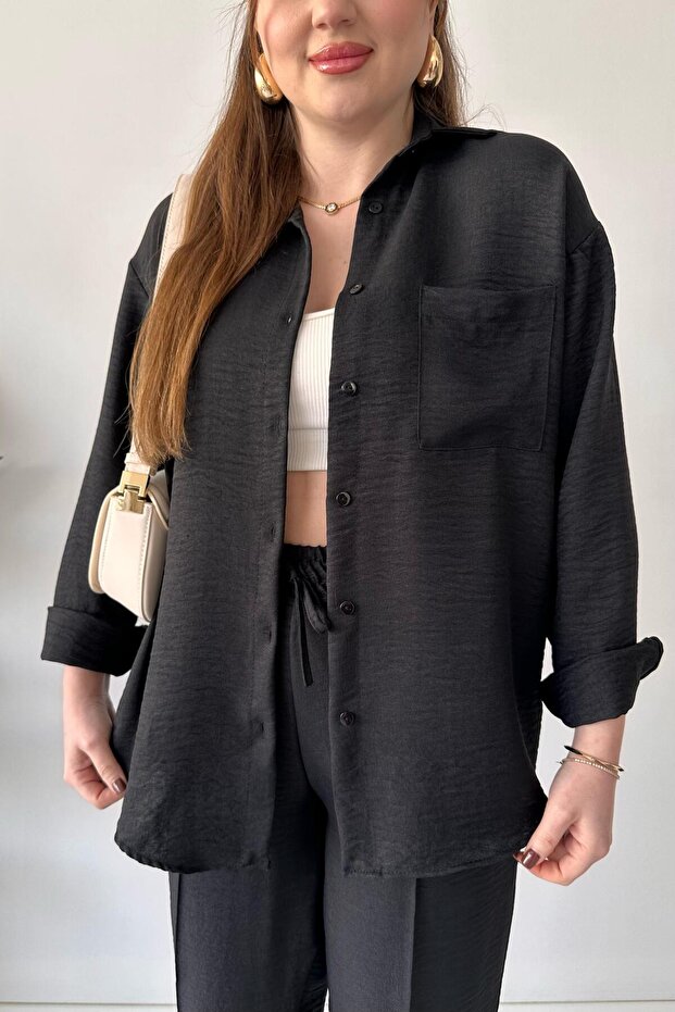 بدلة كتان مزدوجة باللون الأسود - 6