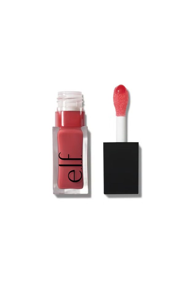 Nourishing tinted lip oil in shade Rose Envy with a high-shine, rosey red finish.