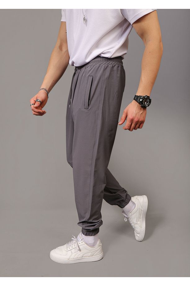 Paraşüt Kumaş Regular Fit Paça Lastikli Cep Fermuarlı Eşofman Altı - 5
