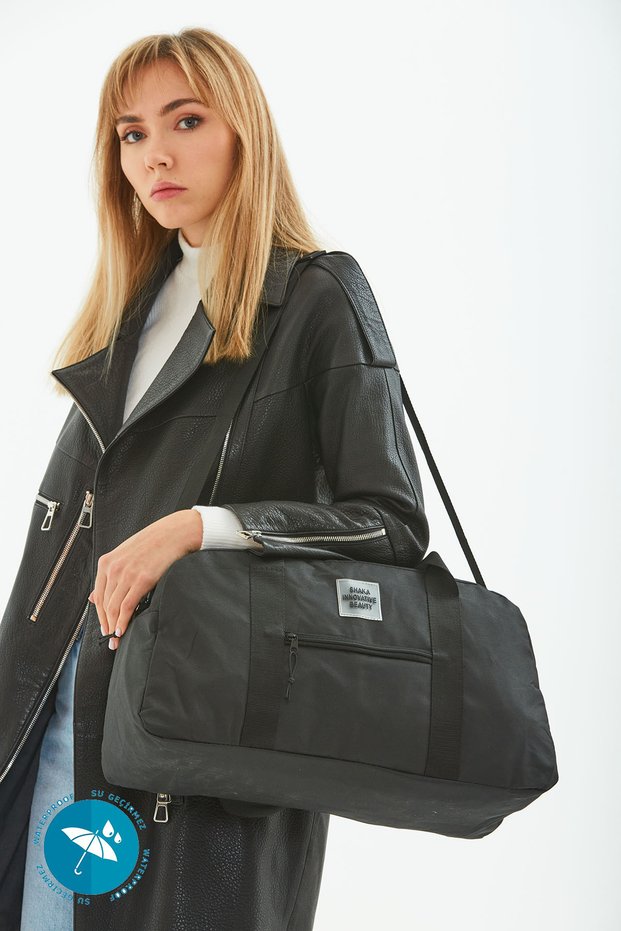 Black U33 Waterproof Travel Fitness and Sports Bag with Front Pocket Detail and Adjustable Strap B:28 E:48