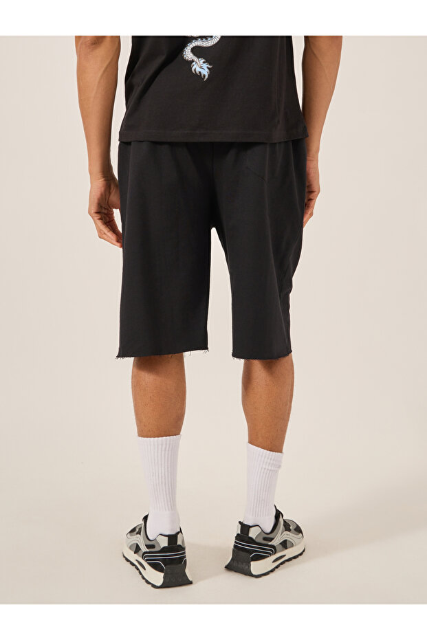 شورت تيري سادة كبير الحجم بحافة خام - 4