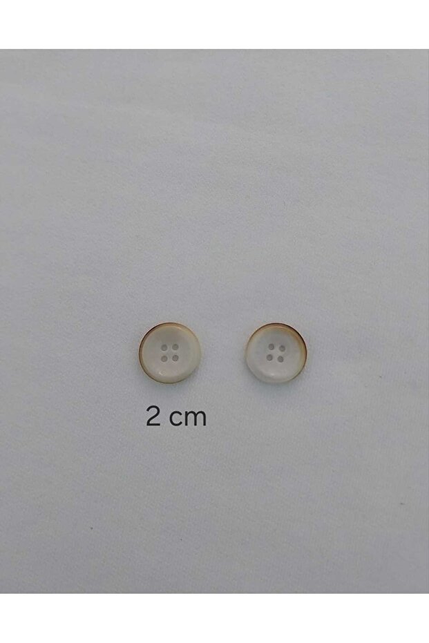 زر بوليستر منقوش بلون كريمي قطر 2 سم 20 قطعة. - 3