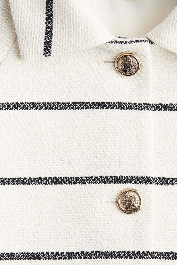 سترة قصيرة الأكمام - 2