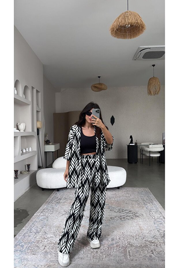 بدلة معطف ملفوفة منقوشة بالأبيض والأسود - 6