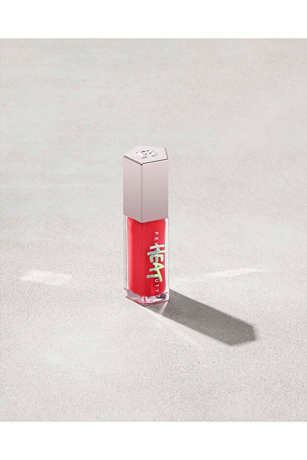 GLOSS BOMB HEAT UNIVERSAL LIP LUMINIZER + PLUMPER Hot Cherry - sheer red