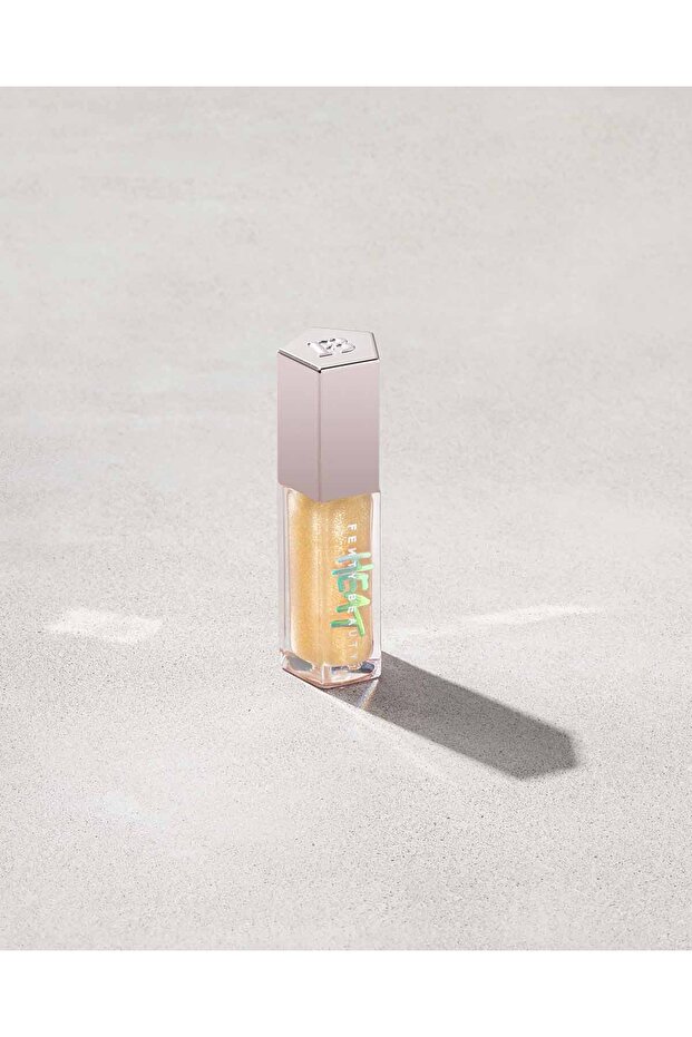 GLOSS BOMB HEAT UNIVERSAL LIP LUMINIZER + PLUMPER Lemon Lava - clear with gold shimmer