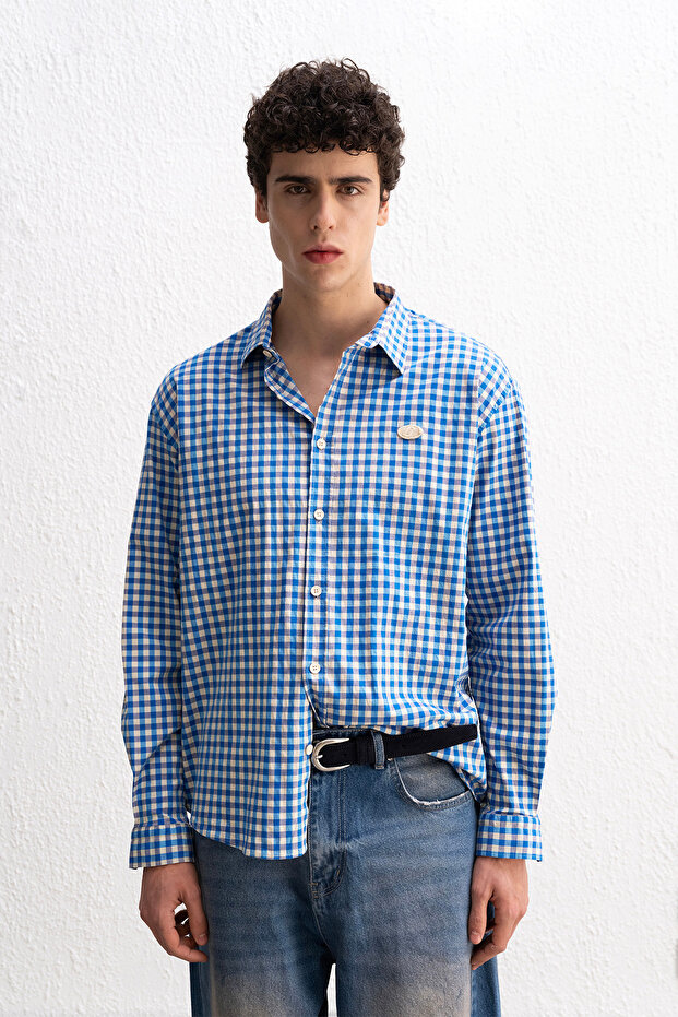 قميص أزرق منقوش - 1