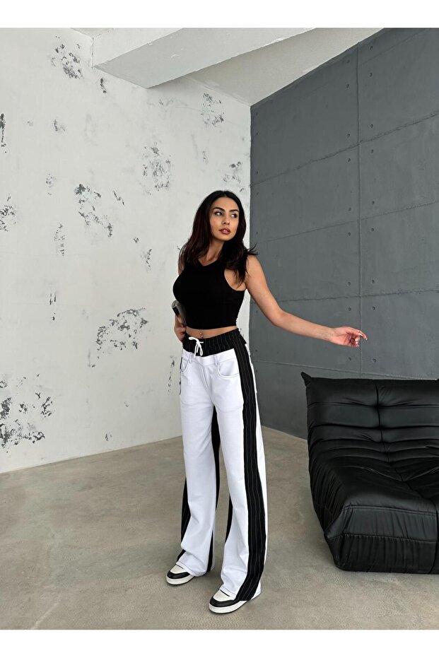 Bílé pytlovité kalhoty - černý detail, proužek, elastický pas - 1