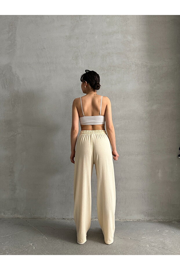 Dámské krémové kalhoty Palazzo s elastickým pasem - 6